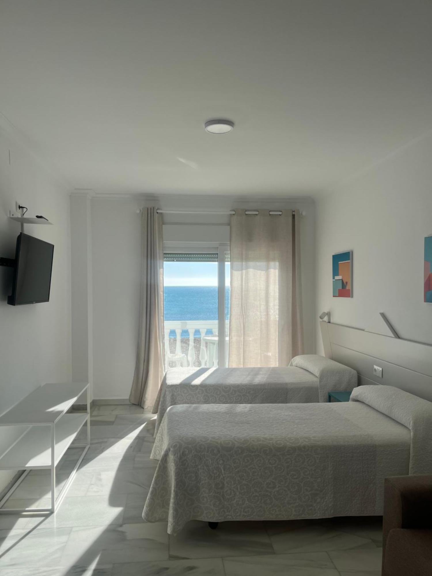 Apartamentos Guaquin ตอร์เรโมลิโนส ภายนอก รูปภาพ